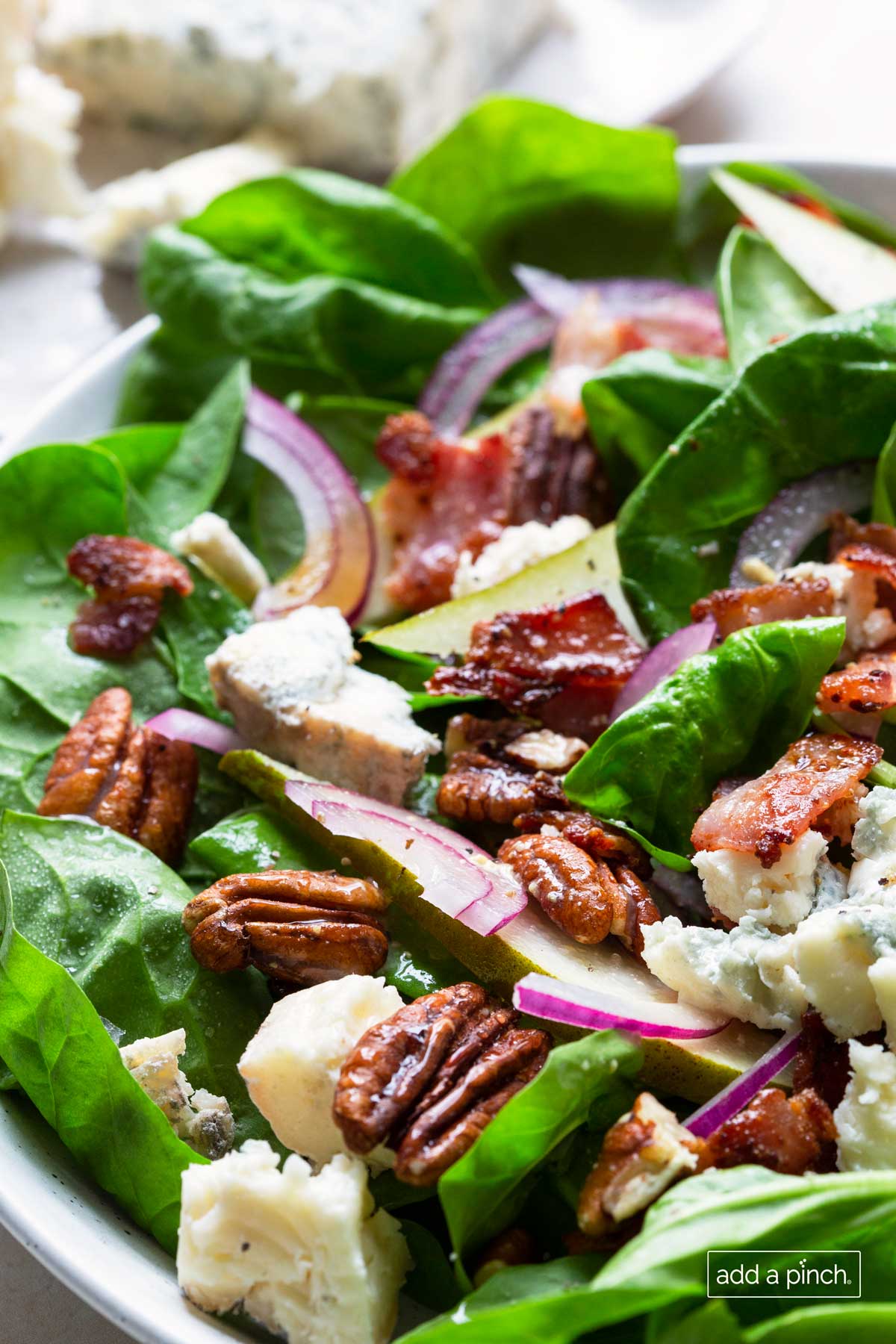 Gourmet Spinach Salad: Pears, Bacon Dressing, & Blue Cheese Recipe